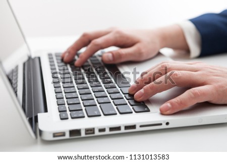 Close Up of businessman hands using laptop computer with blank copy space screen for your advertising text message or content business