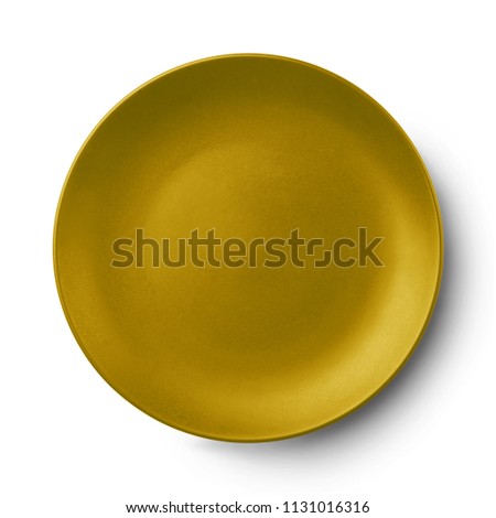 Empty ceramic round plate isolated on white with clipping path and shadow.View from above.