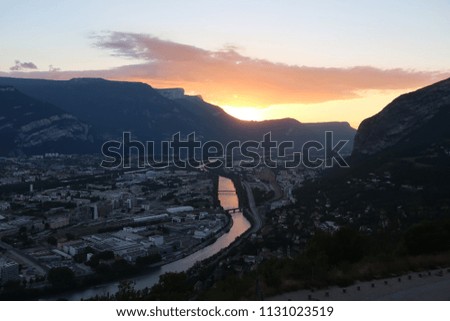Sunset over the city of Grenoble, France
