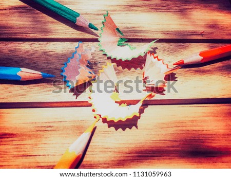 wooden table color pencils pencil sharpener