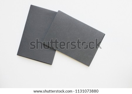 Business blank black card placed on the desk top view to design for you.