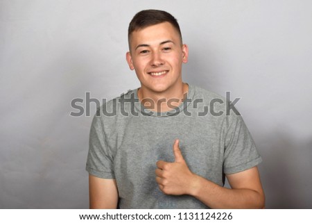 portrait of a young guy, finger