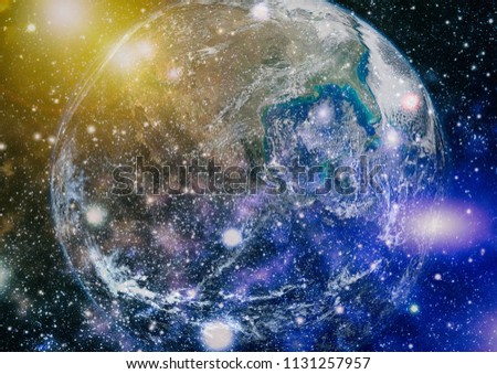 Earth, sun and galaxy. Elements of this image furnished by NASA