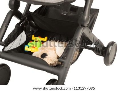 A stroller on a white background, details of a stroller close-up.