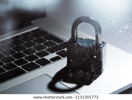 Lock on the laptop background,Cyber safety concept