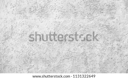 Elegant subtle decorative grey paper surface close up.