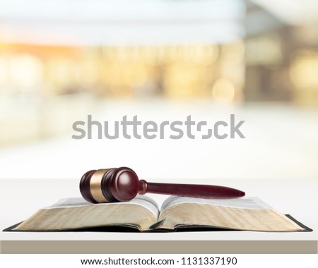 Books and justice wooden gavel