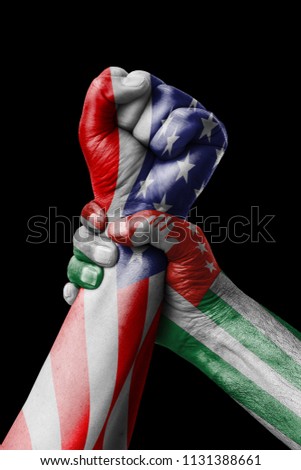 AMERICA VS ABKHAZIA, Fist painted in colors of Abkhazia flag, fist flag, country of Abkhazia