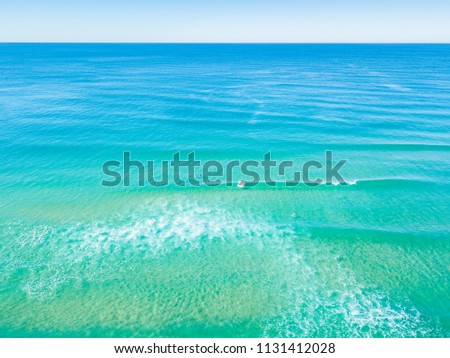 An aerial view of the beach on a clear day on the Gold Coast in Australia