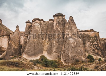 Fairy chimneys, tall, cone-shaped rock formations clustered in Monks Valley, Göreme and elsewhere in Cappadocia.