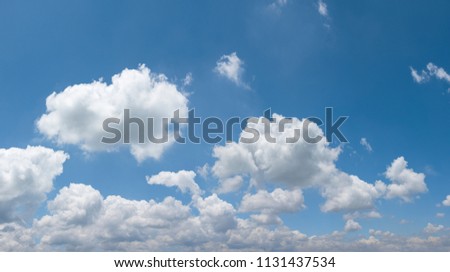 blue skies with clouds