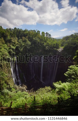 Tumpak Sewu Waterfall at the middle of Lumajang and Malang, East Java, Indonesia. 