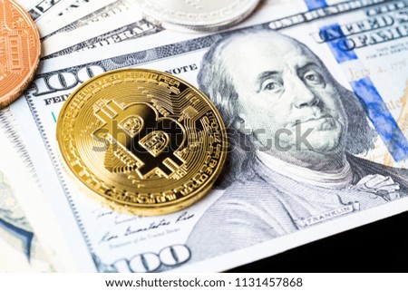 Digital crypto currency gold bitcoin and american dollars. Business concept of new virtual money