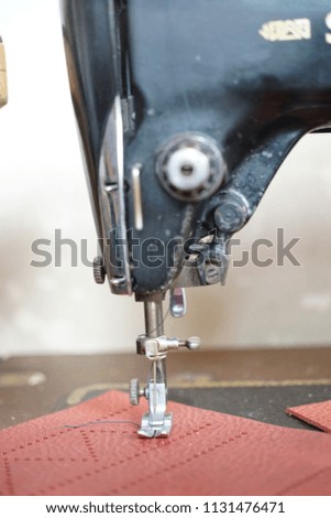 sewing machine on the leather brown color