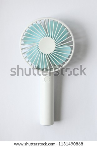 white and blue Portable Mini Fan isolated on white background