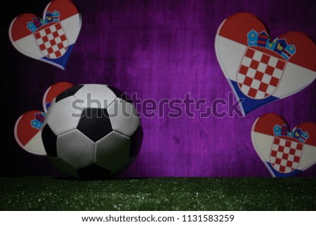 Hearts with Croatia flag and soccer ball.Concept sport. Selective focus