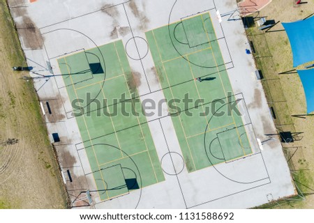 Aerial view of community basketball hard court 