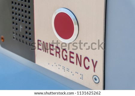 Close-up view of emergency button for requesting immediate assistance Royalty-Free Stock Photo #1131625262