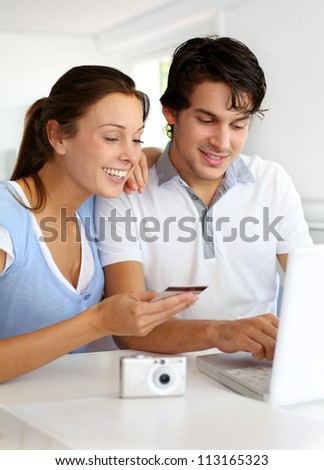 Couple having their pictures developed on internet