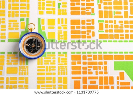Compass on city map