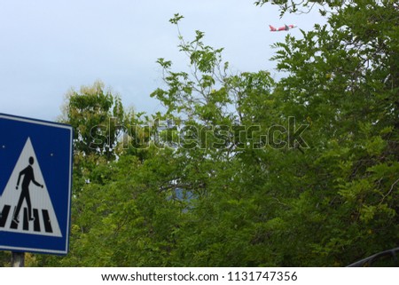 walking sign on blue background