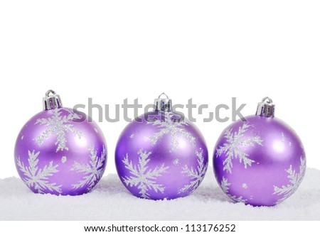 The christmas tree ball in snow isolated