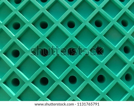 Green grid, lines in the form of a square. Pattern background, texture. Royalty-Free Stock Photo #1131765791