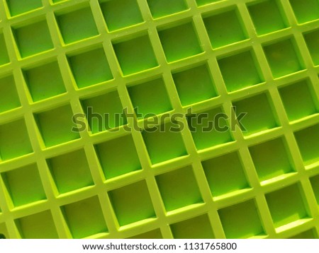 Green grid, lines in the form of a square. Pattern background, texture.