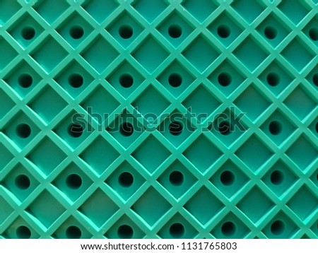 Green grid, lines in the form of a square. Pattern background, texture. Royalty-Free Stock Photo #1131765803
