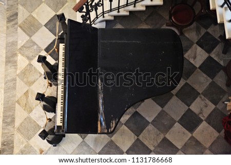 Very old piano in a historical home