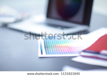 closeup of a laptop on the table of the designer