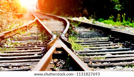 Two railway tracks merge together. Royalty-Free Stock Photo #1131827693
