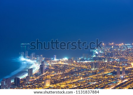 Aerial view of the port city of Iquique in the coast of the Atacama desert at dawn, Chile