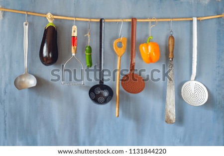 Various vintage kitchen utensils and vegetables, good copy space