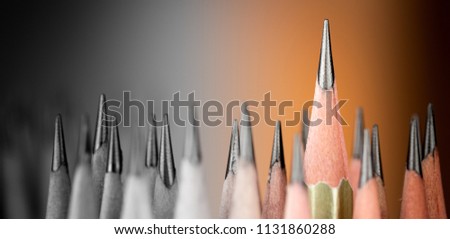 One pencil standing out from the group of other pencil.Leadership and growth in business concept.
 Royalty-Free Stock Photo #1131860288