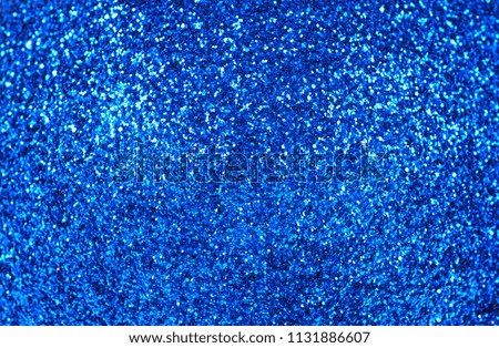 Detailed texture of glittering blue dust surface
