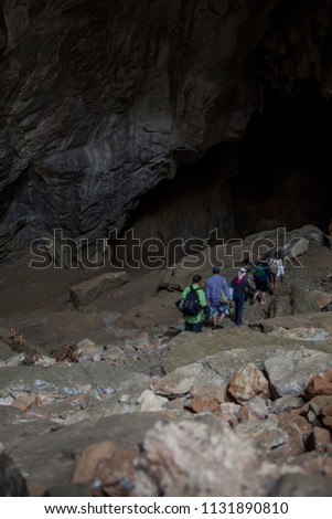 Tourists visit to Thai  cave in the holiday.