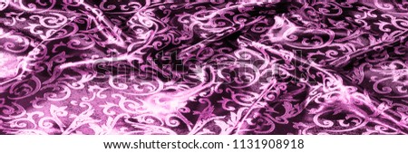 texture background pattern of silk fabric Royal monogram. pink. It is a red cranberry velvet with a royal gold font, creating a classic floral pattern. Light weight, great for design.