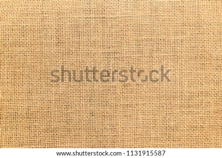 Brown sackcloth or burlap texture background.