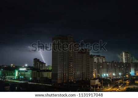 lightning over the city at nightduring a thunderstorm