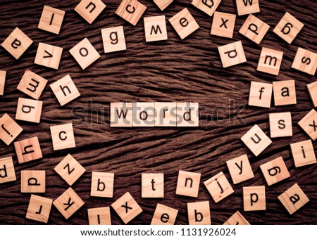 Word written cube on wooden background. Vintage concept.
