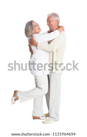portrait of  senior couple hugging