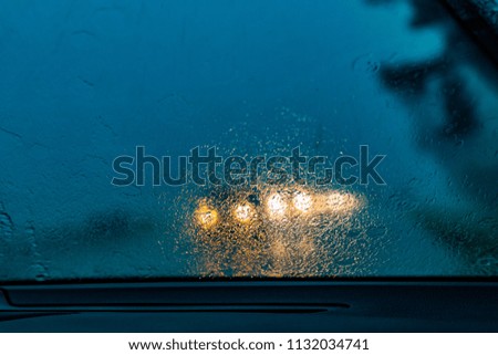 Assateague Island National Seashore, Virginia, stormy heavy rain through the windshield of a car