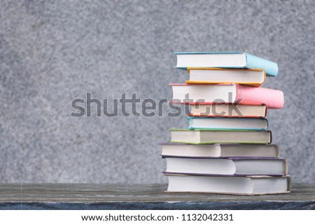 Books on wooden table.