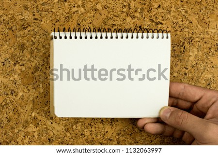 White notepad on a table. Empty space for text.  School and education concept
