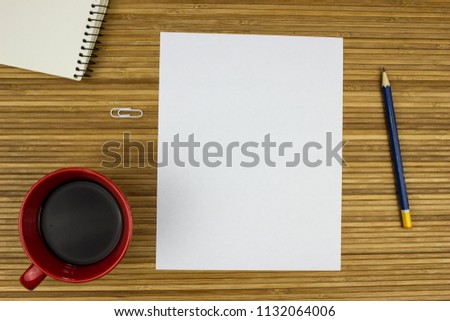 White notepad on a table. Empty space for text.  School and education concept