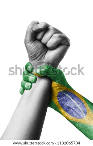 Fist painted in colors of Brazil flag, fist flag, country of Brazil