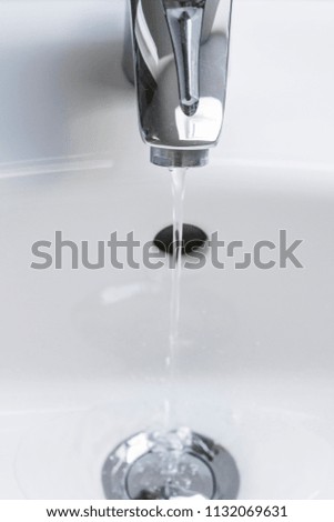 bubbling faucet on a sink