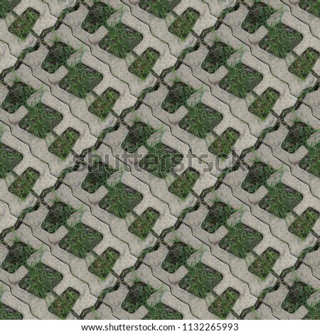 Seamless pattern with stone blocks of the original form on a park path covered and green grass Royalty-Free Stock Photo #1132265993