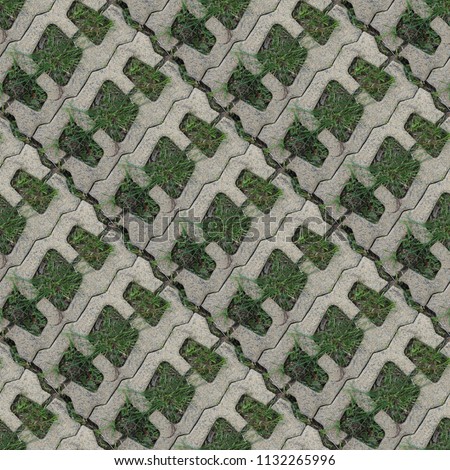 Seamless pattern with stone blocks of the original form on a park path covered and green grass Royalty-Free Stock Photo #1132265996